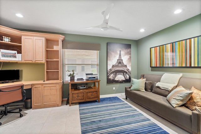 interior space featuring light tile patterned floors, recessed lighting, a ceiling fan, baseboards, and built in study area