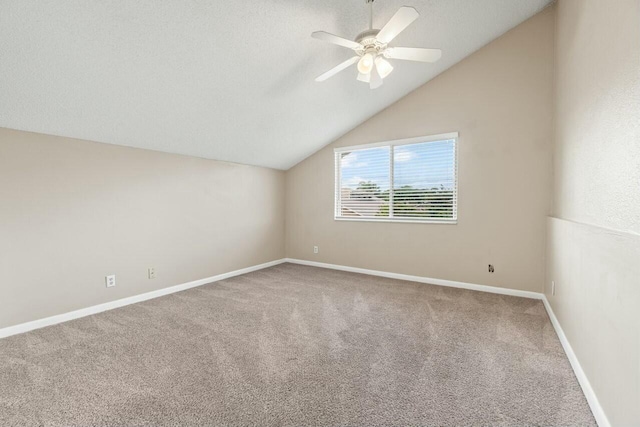 bonus room with baseboards, a ceiling fan, lofted ceiling, carpet, and a textured ceiling