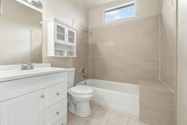 bathroom featuring bathing tub / shower combination, vanity, toilet, and tile patterned floors