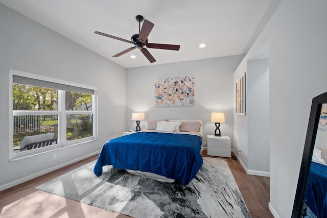 bedroom with ceiling fan, baseboards, wood finished floors, and recessed lighting