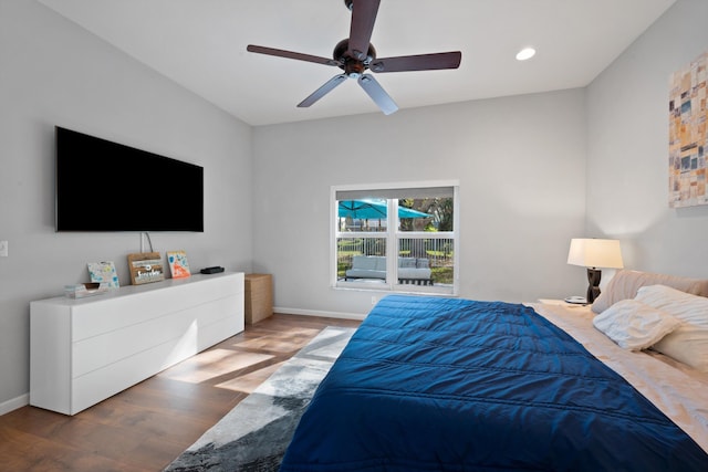 bedroom with recessed lighting, ceiling fan, baseboards, and wood finished floors