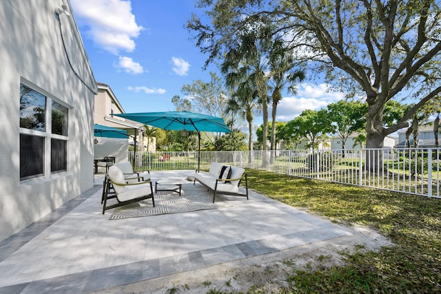 view of patio with fence and an outdoor living space