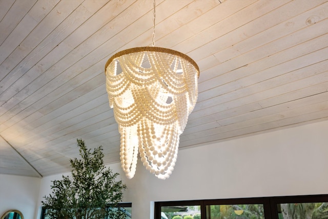 interior details with wood ceiling and a chandelier