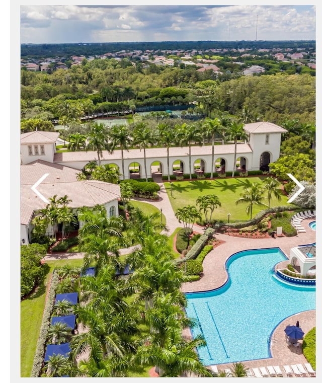 pool with a patio area