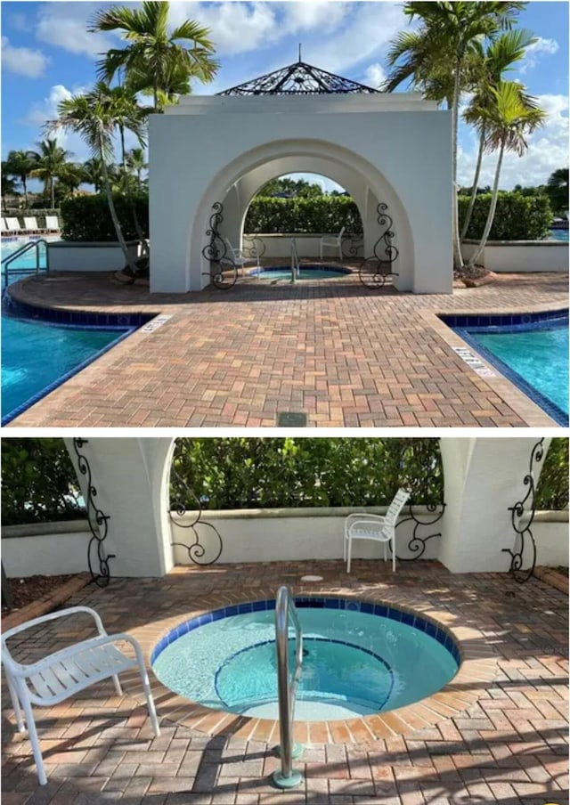 pool with a community hot tub and a patio