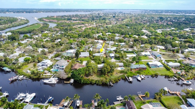 birds eye view of property featuring a residential view and a water view