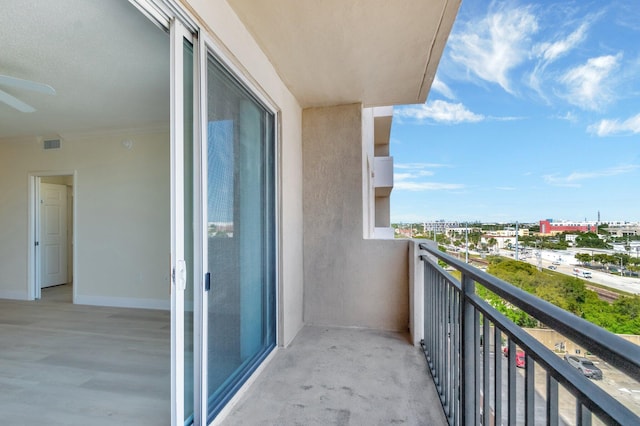 balcony with a view of city and visible vents