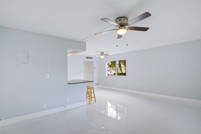 spare room with visible vents and baseboards