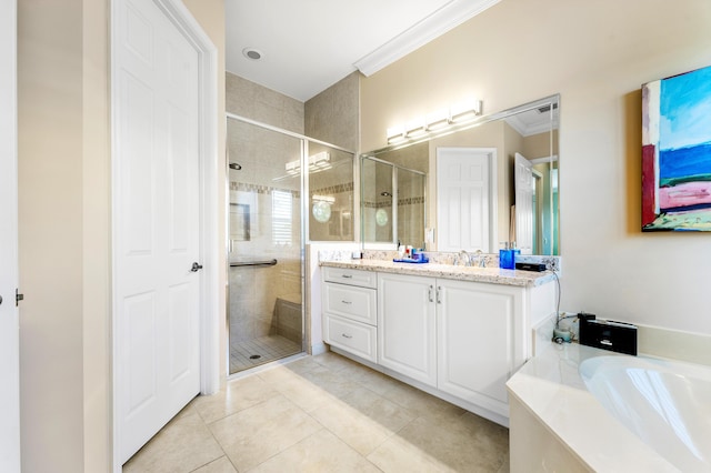 bathroom with vanity, a bath, tile patterned floors, a stall shower, and crown molding