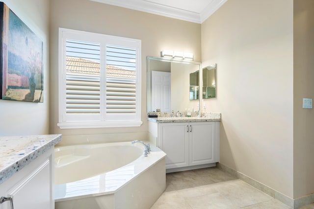 full bath featuring baseboards, tile patterned floors, a garden tub, crown molding, and vanity