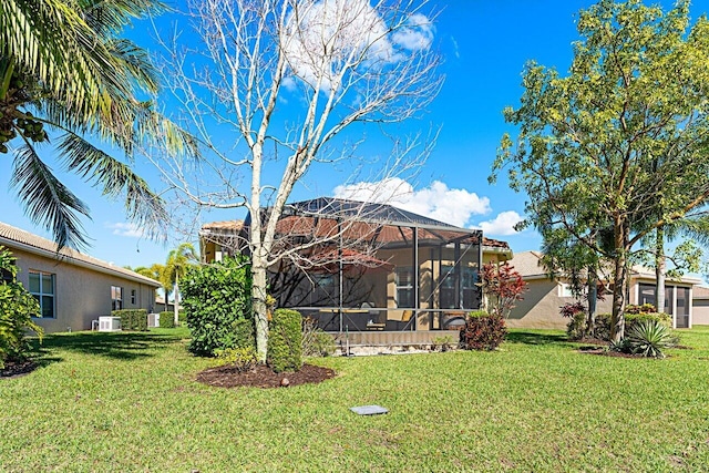 view of yard with a lanai