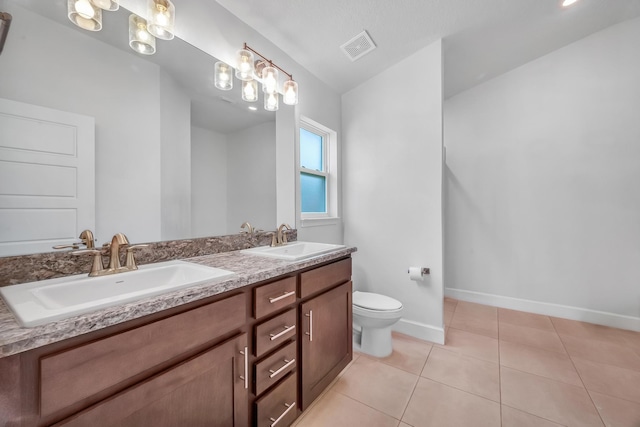 5361 San Benedetto Pl, Fort Pierce, FL 34951 - full bathroom featuring tile patterned flooring, visible vents, a sink, and toilet