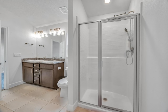 5361 San Benedetto Pl, Fort Pierce, FL 34951 - full bath featuring tile patterned flooring, a sink, visible vents, double vanity, and a stall shower