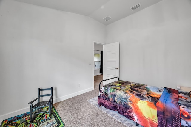 5361 San Benedetto Pl, Fort Pierce, FL 34951 - bedroom with lofted ceiling, carpet flooring, visible vents, and baseboards