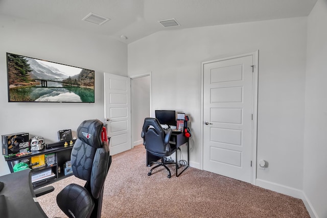 5361 San Benedetto Pl, Fort Pierce, FL 34951 - carpeted home office with lofted ceiling, visible vents, and baseboards