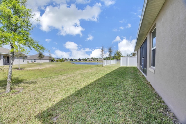 5361 San Benedetto Pl, Fort Pierce, FL 34951 - view of yard with a water view and fence