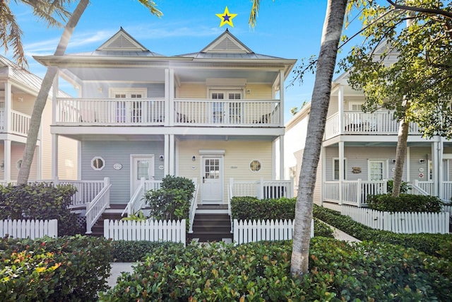 view of front of house with fence