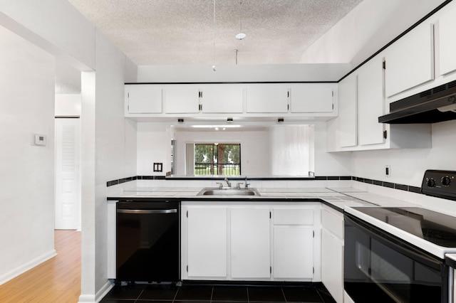 kitchen with white cabinets, dishwashing machine, black range with electric stovetop, under cabinet range hood, and a sink