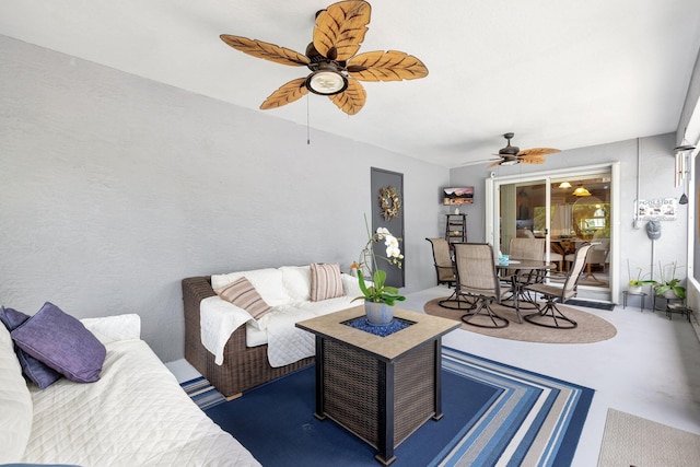 view of patio / terrace with outdoor dining area, ceiling fan, and an outdoor hangout area