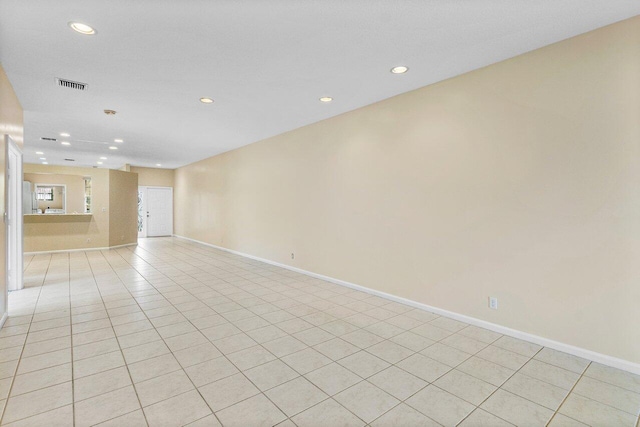 spare room with recessed lighting, visible vents, baseboards, and light tile patterned floors