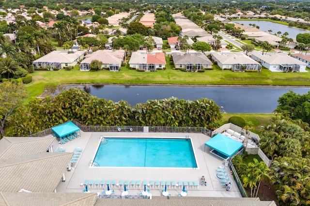 aerial view with a residential view and a water view