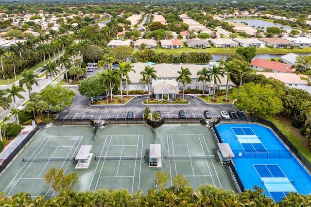 bird's eye view with a residential view and a water view