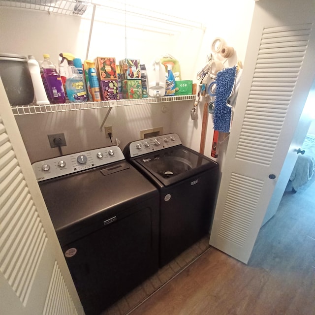 5070 Nesting Way Unit B, Delray Beach, FL 33484 - clothes washing area featuring laundry area, wood finished floors, and independent washer and dryer