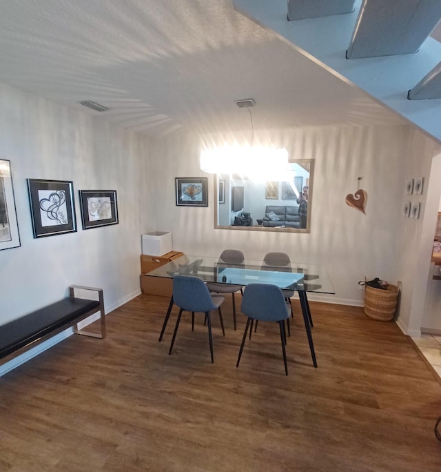 5070 Nesting Way Unit B, Delray Beach, FL 33484 - dining area featuring wood finished floors, visible vents, and baseboards