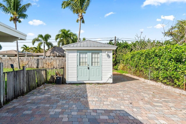 view of shed featuring a fenced backyard