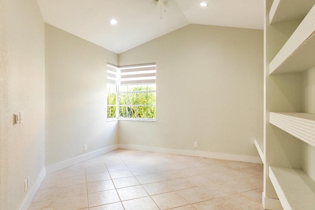 interior space featuring vaulted ceiling, light tile patterned floors, recessed lighting, and baseboards