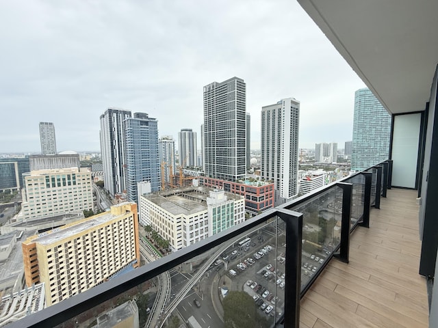 balcony featuring a city view