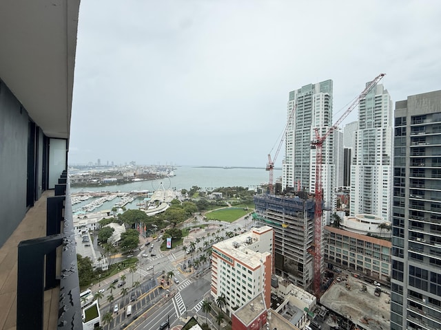 property's view of city with a water view