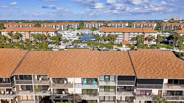 birds eye view of property featuring a water view