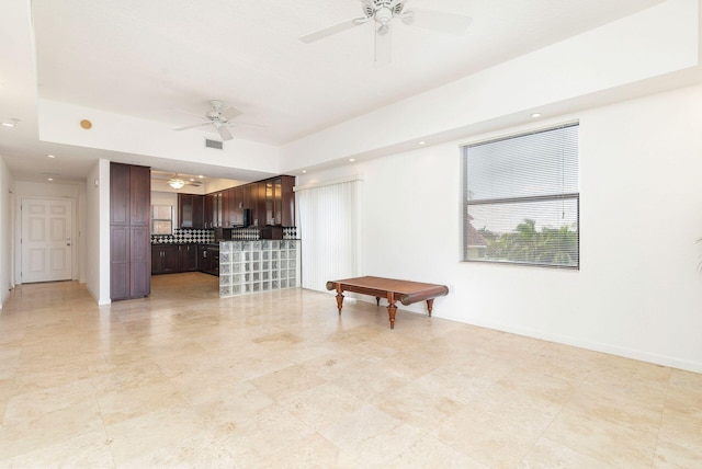 living room with a ceiling fan, recessed lighting, visible vents, and baseboards