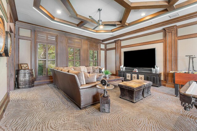 living room with visible vents, coffered ceiling, and ornamental molding