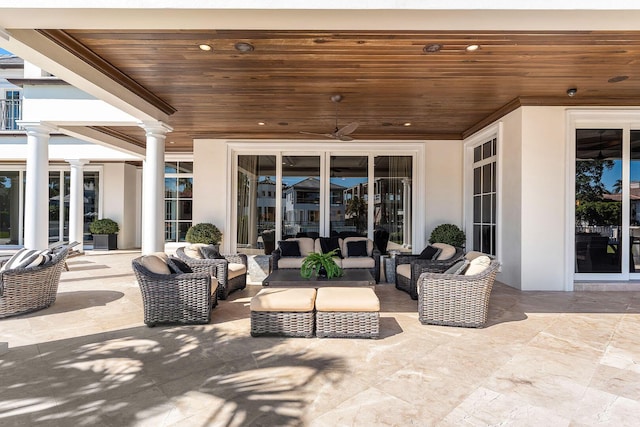 view of patio featuring a ceiling fan and outdoor lounge area