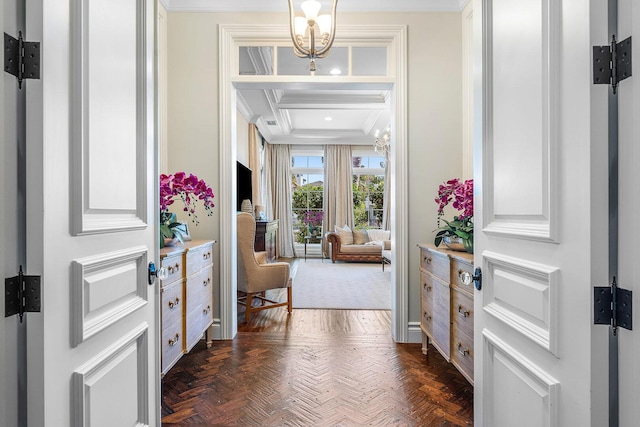 entrance foyer featuring crown molding and a tray ceiling