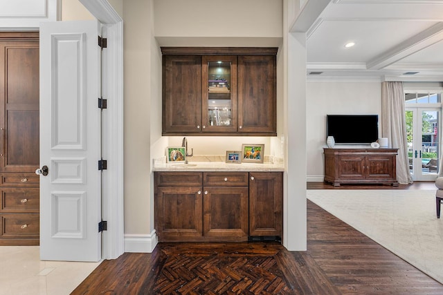 bar featuring recessed lighting, parquet floors, and baseboards