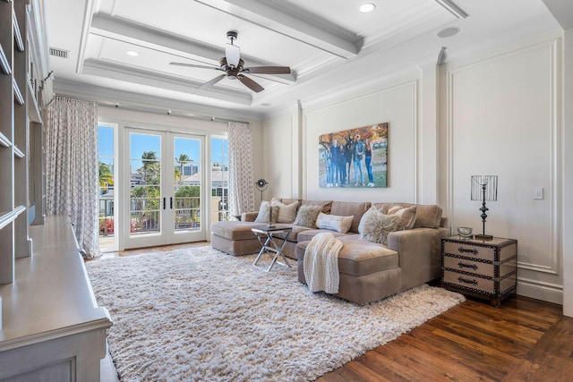 living area featuring beamed ceiling, coffered ceiling, dark wood-style floors, french doors, and crown molding