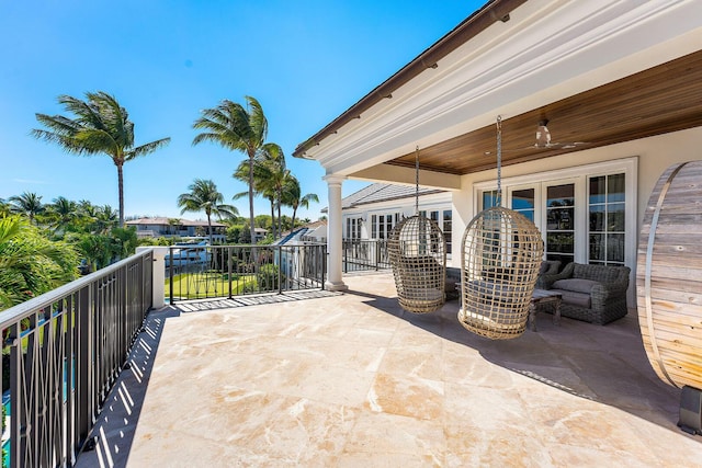 view of patio with a balcony