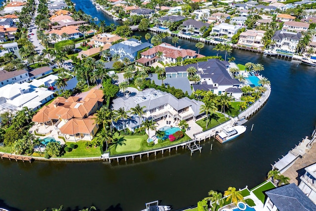 aerial view with a residential view and a water view