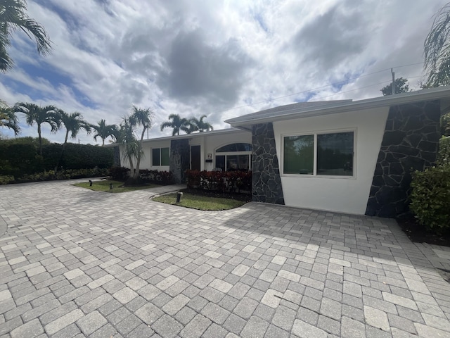 exterior space featuring stucco siding