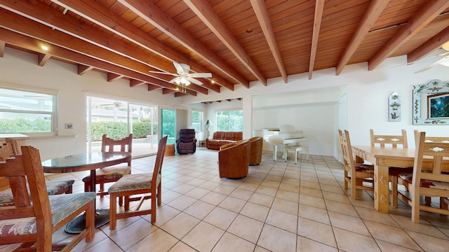 dining area featuring a ceiling fan, wood ceiling, beam ceiling, and light tile patterned floors