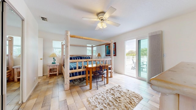 dining area featuring light wood-type flooring, visible vents, ceiling fan, and baseboards