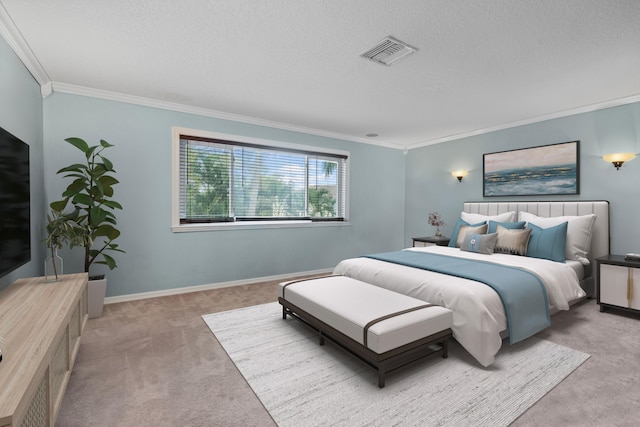 bedroom featuring carpet floors, ornamental molding, a textured ceiling, and baseboards