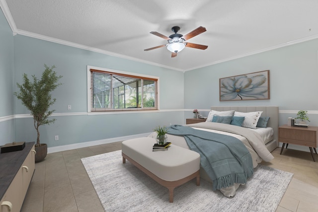 bedroom with light tile patterned floors, crown molding, and a ceiling fan