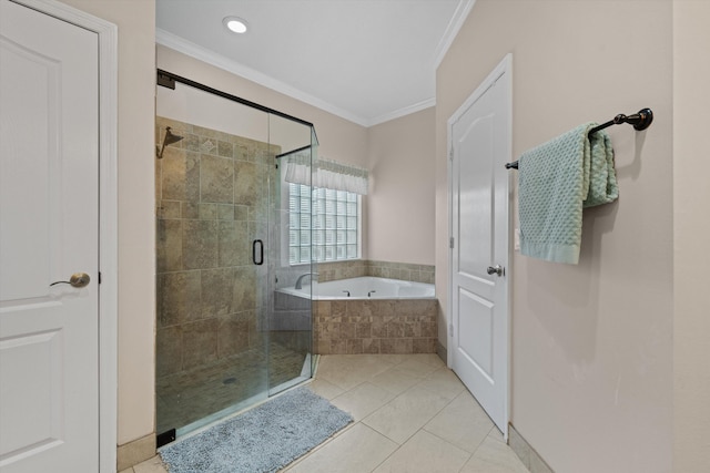 full bathroom with ornamental molding, a shower stall, a garden tub, and tile patterned flooring