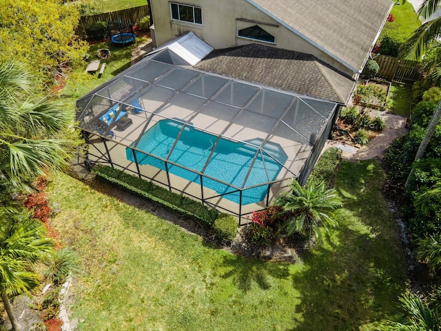 view of subject property with a pool area