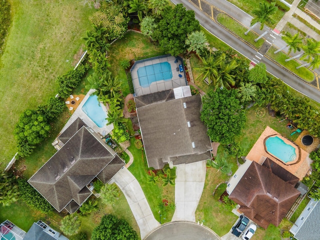 drone / aerial view of a pool