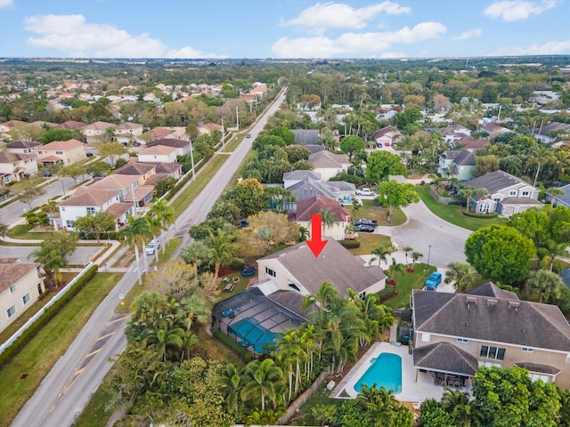 aerial perspective of suburban area with a pool